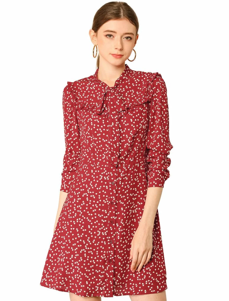 Elegant Polka Dot A-Line Dress with Tie Neck and Ruffle Detail
